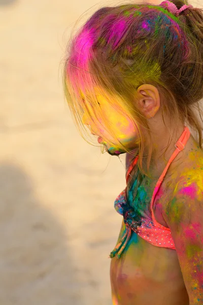 Cte young little girl with colored face, beach party