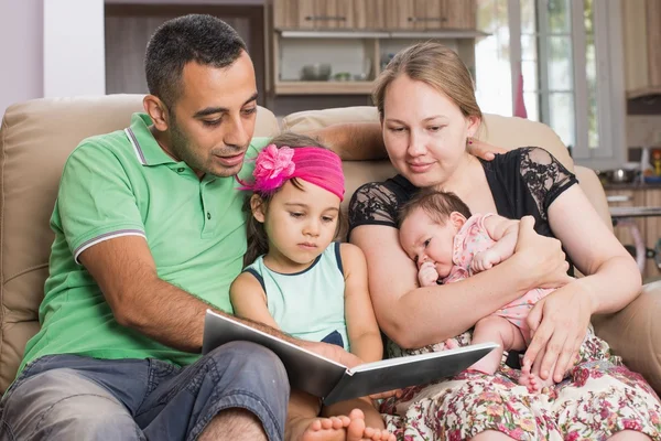 Family Reading Book Together