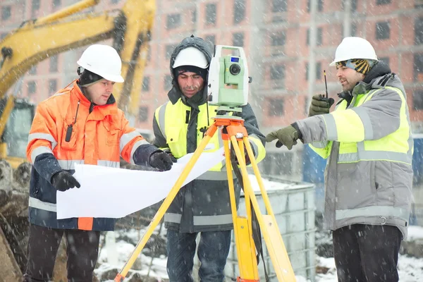 Civil Engineers At Construction Site In Winter Season