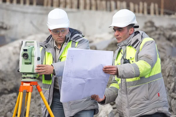 Civil Engineer and Surveyor At Consruction Site