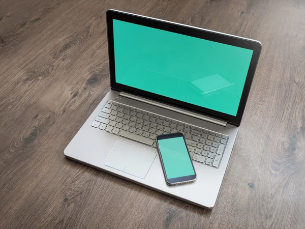 Laptop and mobile smartphone with blank screen, notebook mockup