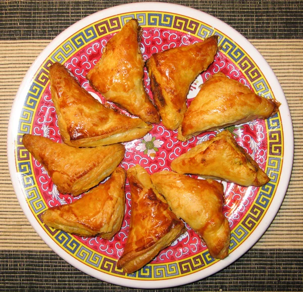 Plate of spicy Curry Puffs