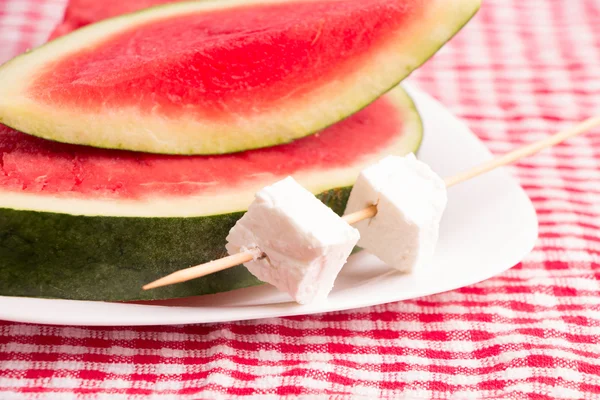 Watermelon slices & White cheese on plate