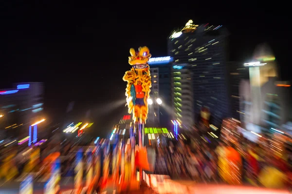 Acrobats perform lion dance show during  dance competitions commemorated to the Chinese New Year