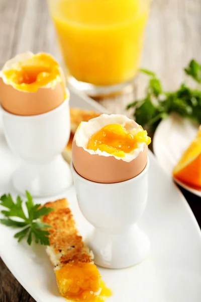 Boiled eggs with toasts