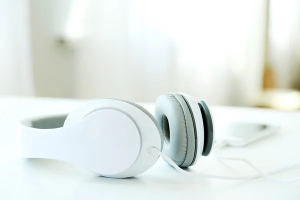 Headphones on a white table