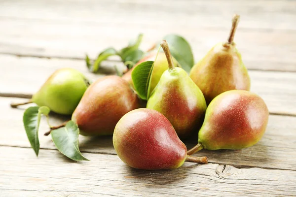 Ripe pears on table