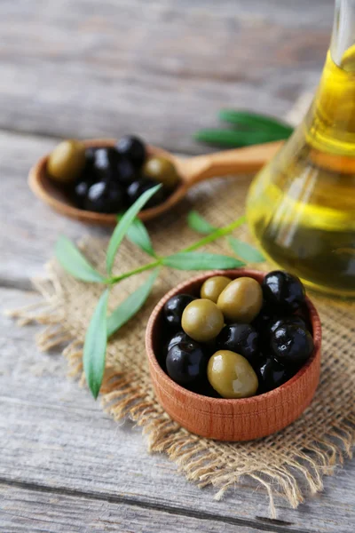 Green and black olives in bowl