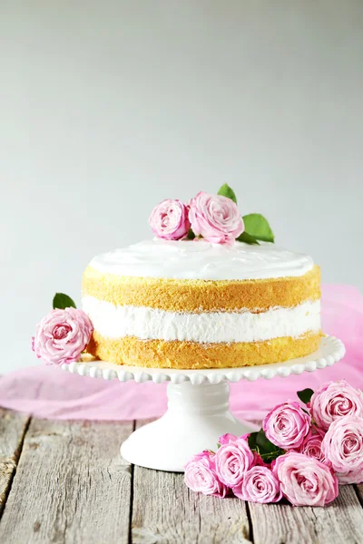 Sweet cake on cake stand