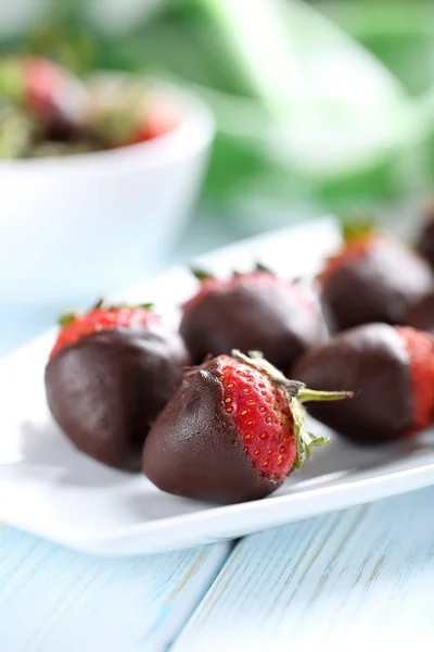 Fresh strawberries dipped in dark chocolate