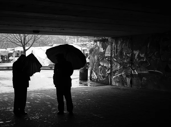 People with umbrellas outdoor