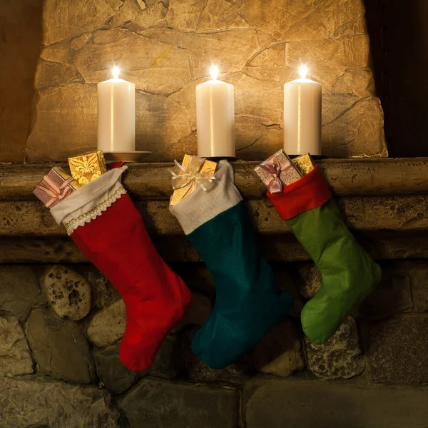 Christmas stockings on fireplace