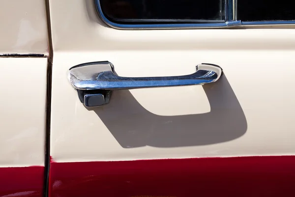 Chromed classic car door handle