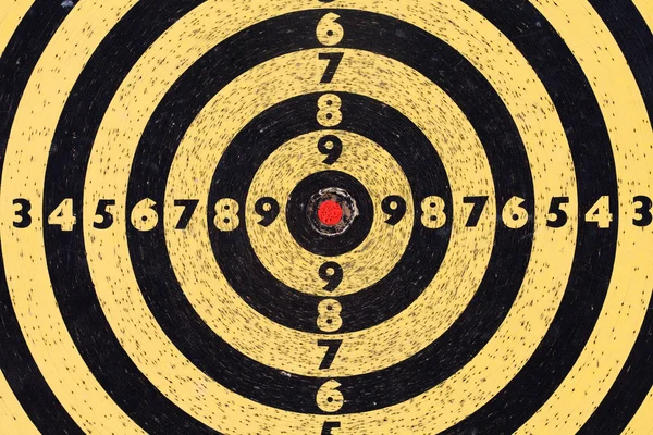 Shooting target. Aim with numbers. Red center. macro view.