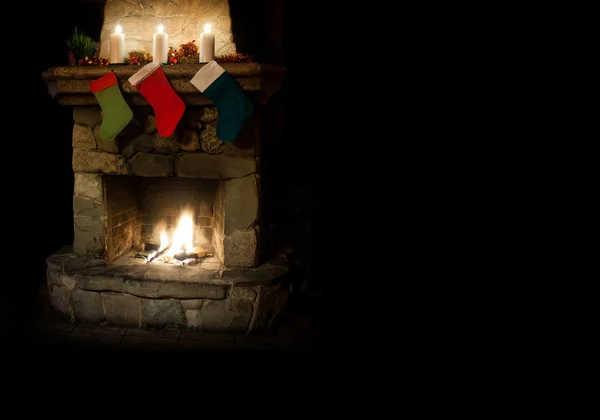 Christmas postcard template. colorful stocking on fireplace background. Chimney place with candles.