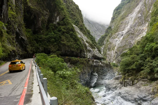 Taxi on the road at the Taroko National Park, Taiwan