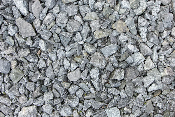 Crushed gray rocks on the ground