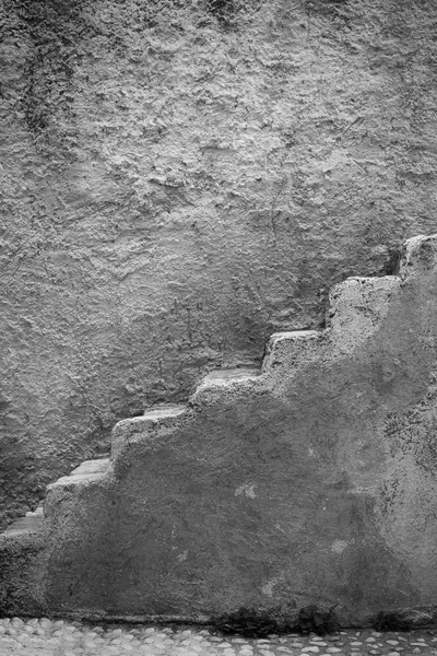 Side view of old stone stairs