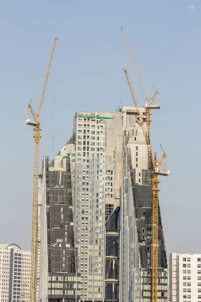 Inside place for many tall buildings under construction and cran