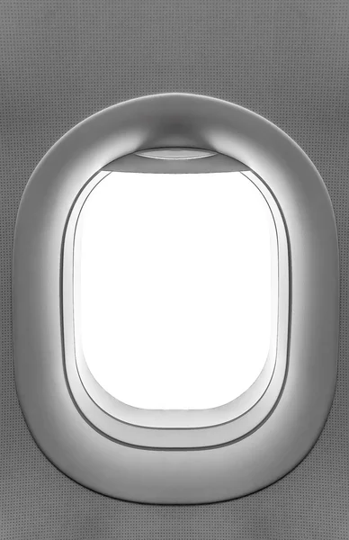 Airplane window. View has been removed from the image