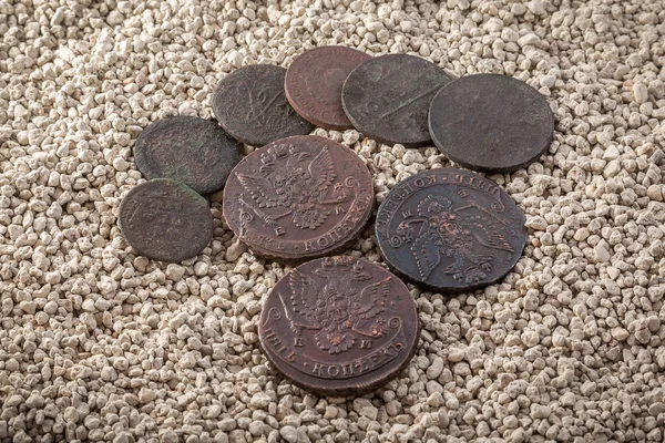 Copper coins in a patina and oxides