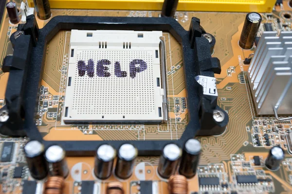 Computer engineer working on an old motherboard