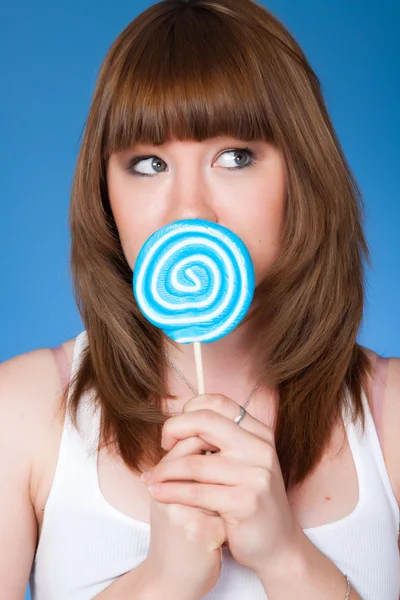 Beautiful blonde girl on a light background