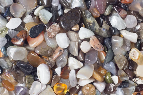 Semi-precious stones of different colors background