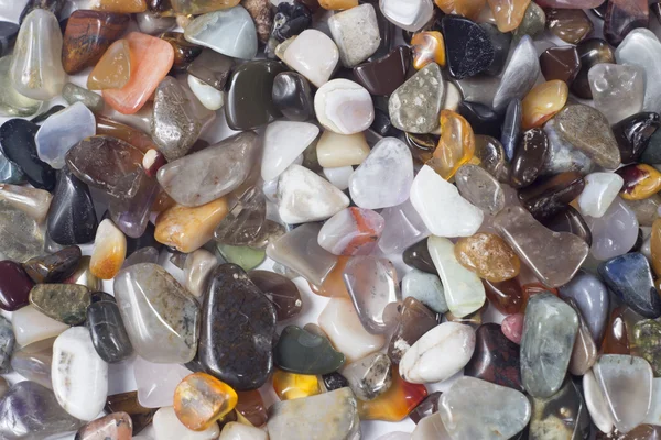 Semi-precious stones of different colors background
