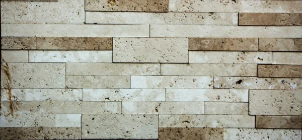 Multicolored marble bricks close-up, sample, background
