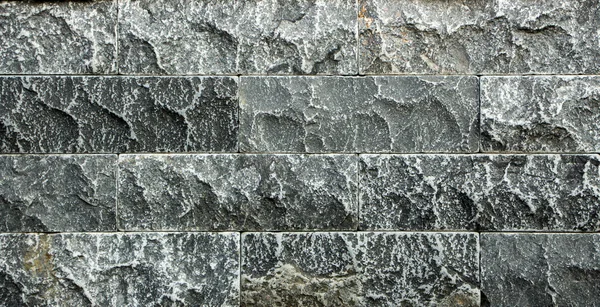 Multicolored marble bricks close-up, sample, background
