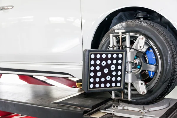 Suspension adjustment and Automobile wheel alignment