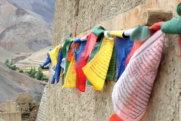 Colorful prayer flags with sun shining through one of prayer flags in Leh, Ladakh, India.