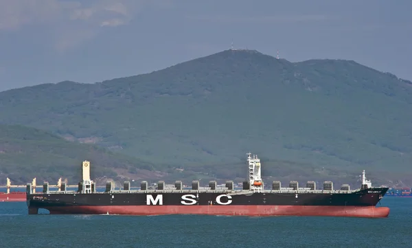 Container ship MSC Amalfi standing on the roads at anchor. Nakhodka Bay. East (Japan) Sea. 13.05.2014