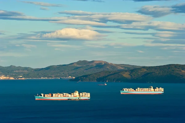 Two container ship Maersk in Nakhodka Bay. Far East of Russia. East (Japan) Sea. 12.10.2012