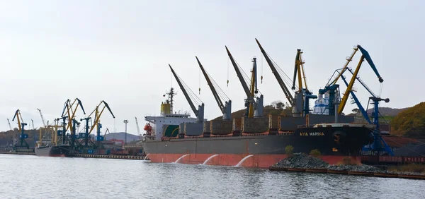 Loading of coal on ship in the port of Nakhodka. Nakhodka Bay. East (Japan) Sea. 20.10.2012