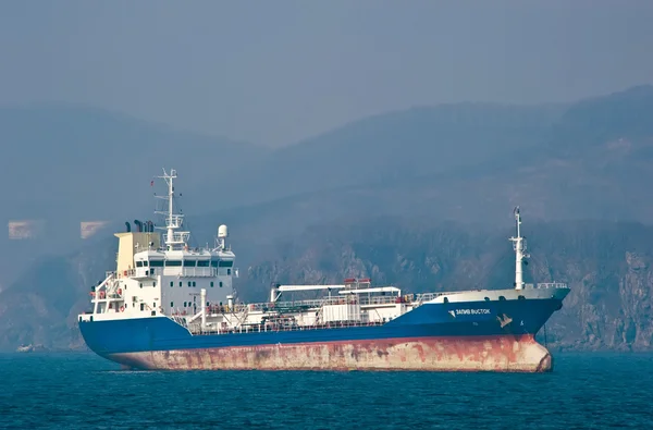 Tanker Zaliv Vostok anchored in the roads. Nakhodka Bay. East (Japan) Sea. 19.04.2014