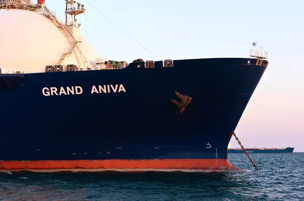 The bow of a huge LNG carrier Grand Aniva at anchored in the roads. Nakhodka Bay. East (Japan) Sea. 31.03.2014