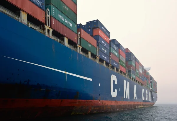 Nakhodka, Russia- 22.07.2015: Container ship CMA CGM Gidra standing on the roads at anchor. Nakhodka Bay. East (Japan) Sea. 22.07.2015