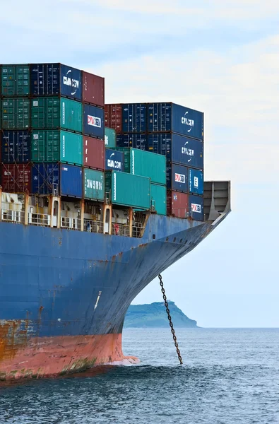 Nakhodka, Russia- 02.08.2015: The bow of a huge container ship CMA CGM Marlin at anchored in the roads. Nakhodka Bay. East (Japan) Sea. 02.08.2015