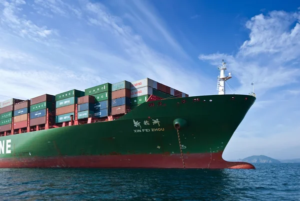 Nakhodka Bay. East (Japan) Sea- September 17.2015: The bow of a huge container ship Xin Fei Zhou at anchored in the roads.