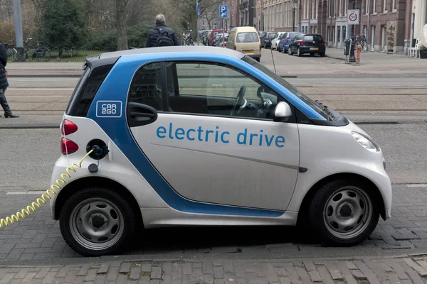 Electric car at a charging station in Amsterdam