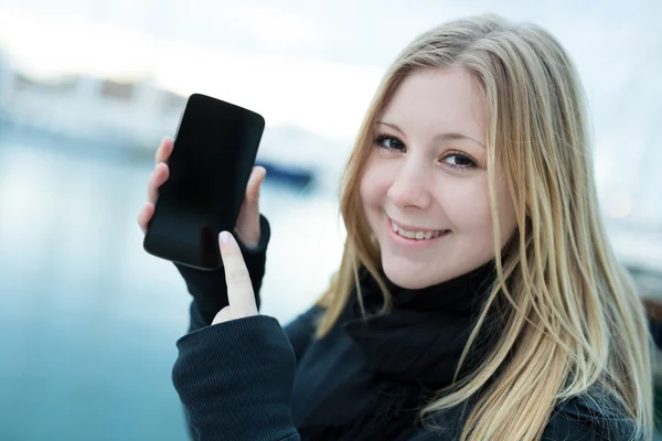 Young woman with mobil phone