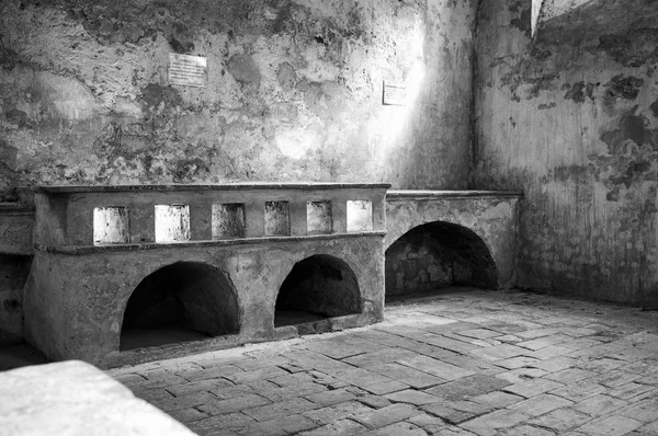 Ancient monastery kitchens. Black and white photo