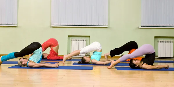 Women of Different Age Practicing yoga