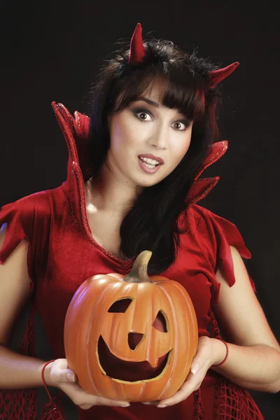 Young Woman in Halloween Costumes of Devil