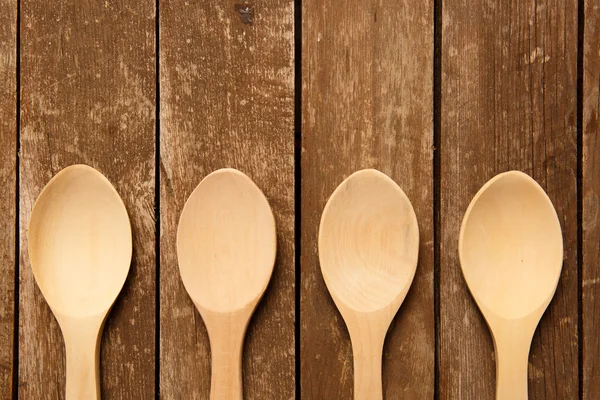 Wood spoons on wood table