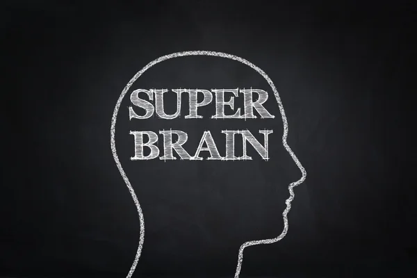 Super brain human head drawing on blackboard