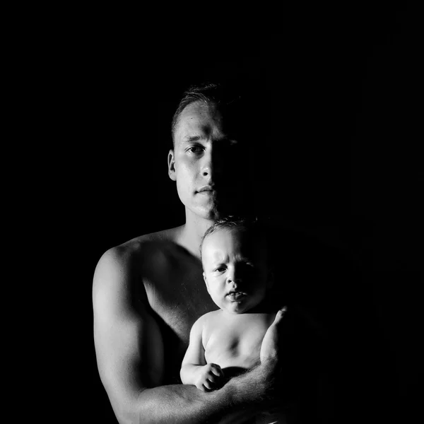 Black and white portrait of father and his son