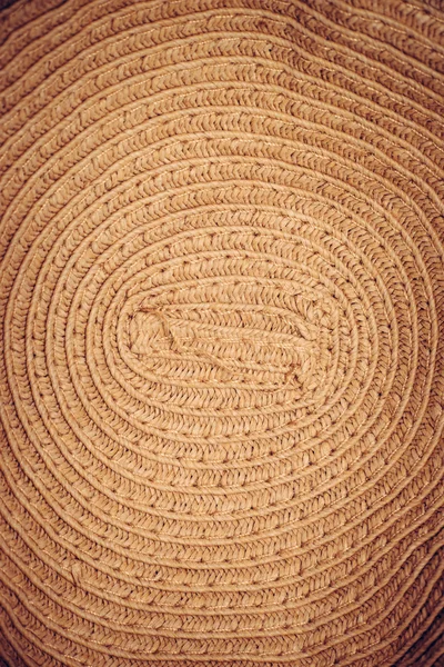 Texture of painted straw hat close up,